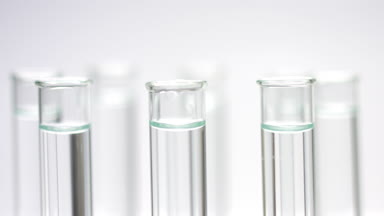Drop blue liquid in test tube with water
