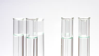 Drop blue liquid in test tube with water