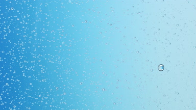 Wet transparent surface with small drops
