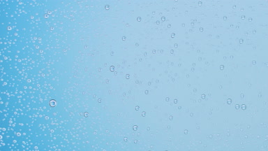 Wet transparent surface with small drops