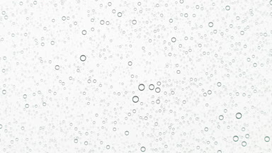 Wet transparent surface with small drops