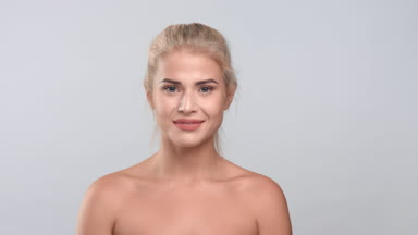 Beauty Portrait of young woman smiling in front of camera.