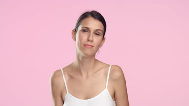 Young brunette woman throws out women shaver