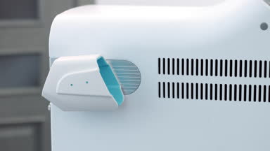 Taking an ipl handpiece of beauty laser machine during procedure