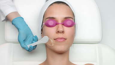 Top view of patient's face during applying ipl gel