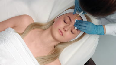 Top view shot of blood facial or PRP cosmetology procedure