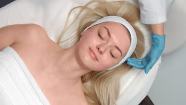 Top view of beauty massage session at the beauty salon