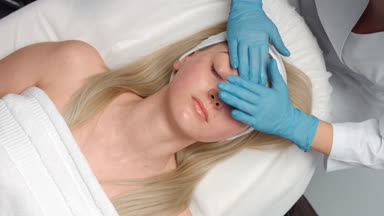 Facial massage procedure top view time lapse