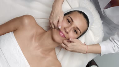 Funny cosmetology facial massage procedure