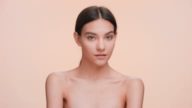 Beauty model turn her face and look at the camera