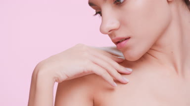 Beauty model posing in front of the camera - skin care concept
