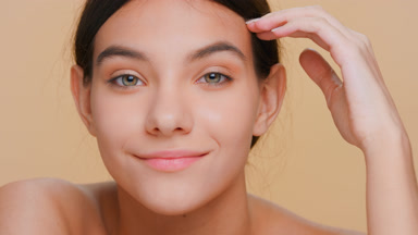 Beauty woman posing for skin care product commercial