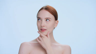 Redhead female beauty model thinking and got an idea