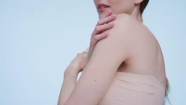 Low angle portrait of ginger woman enjoying her perfect skin