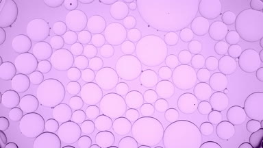 Big clear bubble moves along violet smaller ones and explodes
