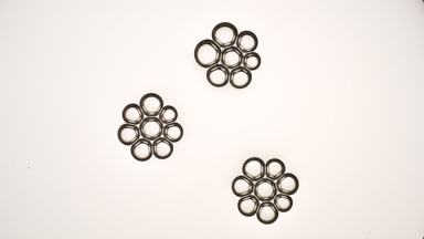 Two bubble clusters join each other in front of another one