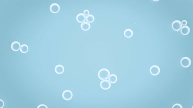 White small soap bubbles attract each other moving spontaneously