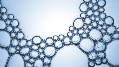A lot of different sized bubbles burst spontaneously at a time