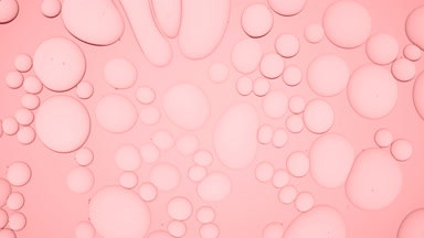 Light pink different sized bubbles move in circles