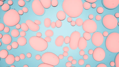 Pink different sized bubbles move in circles