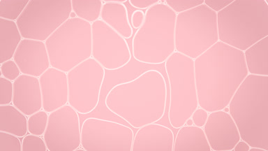Transparent fluid flows between white different sized bubbles