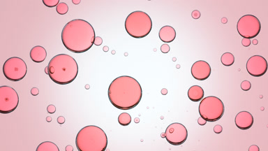 Pink fluid is injected into transparent one with pink bubbles