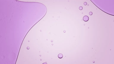 Big purple bubble moves to the left and down in liquid