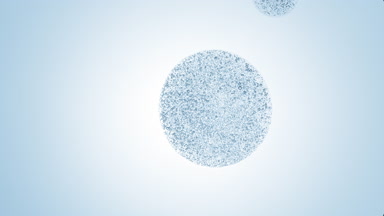 Blue drop with tiny transparent bubbles is dripped from dropper