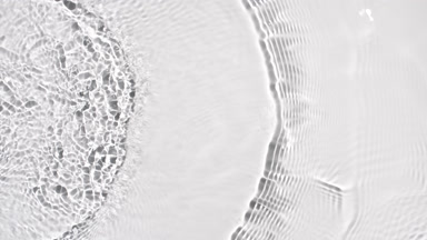 Water ripples with equal frequency creating concentric circles