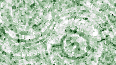 Multiple water drops falling on water surface over green mineral