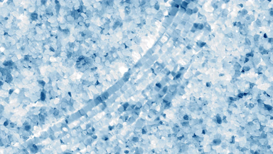 Water waves and ripples crossing over blue crystal mineral