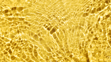 Water flows creating waves, ripples and bubbles