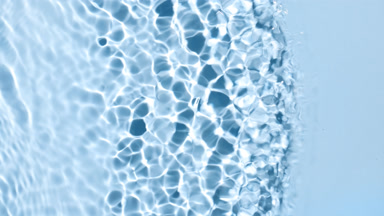 Single wave of water creates ripples and bubbles spontaneously