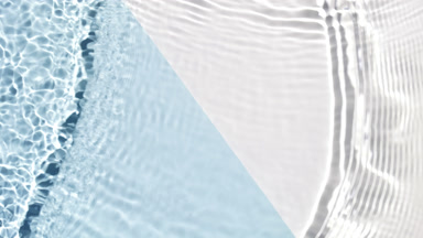 Water waves crossing and splashing on blue and white bg