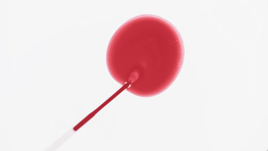 Chemical dropper inject red liquid into transparent one
