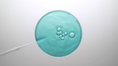 Bubbles come out from dropper and float on cyan fluid bursting
