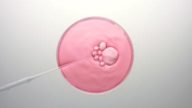 Bubbles come out from dropper and float on pink fluid bursting
