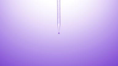 Clear liquid is dripped from graduated chemical dropper