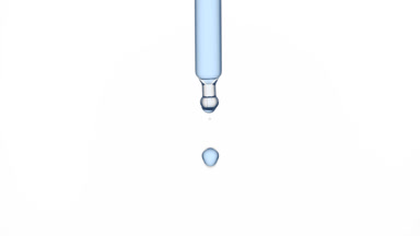 Blue drop is falling down from chemical dropper
