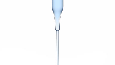 Blue liquid flows from chemical dropper