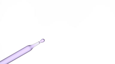 Lavender oil is dripping from chemical dropper