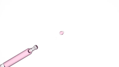 Drops of rosehip oil are dripping from lab dropper
