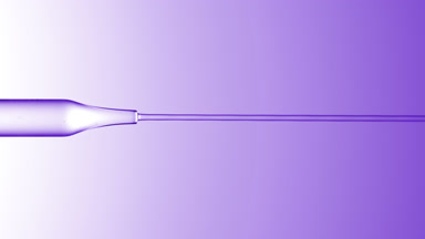 Transparent liquid is flowing from chemical dropper