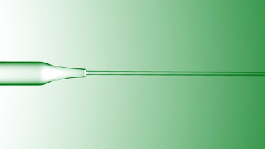 Transparent liquid is flowing from chemical dropper