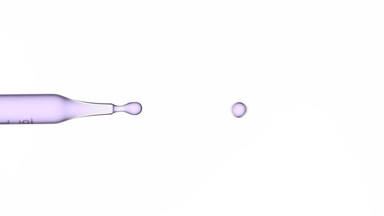 Purple fluid flows from graduated lab dropper