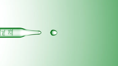 Clear drops are dripped from graduated lab dropper