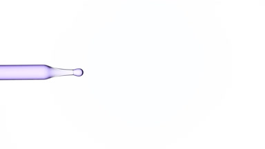 Drops of purple transparent fluid are dripped from dropper
