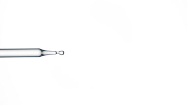 Hyaluronic acid is dripping from pipette