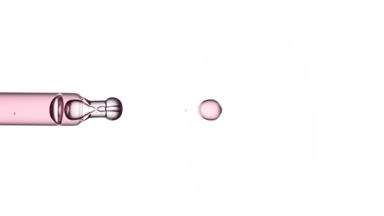 Drop of rose water is dripped from lab dropper