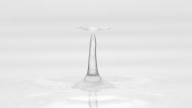 Drop of grey fluid falls down on fluid surface creating circles